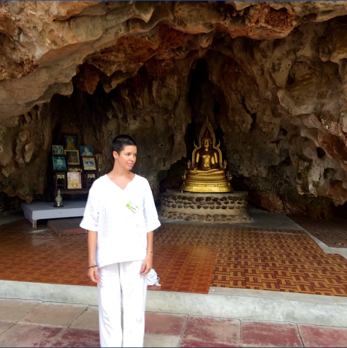 Lauren at a Thai monastery cave during a retreat excursion.